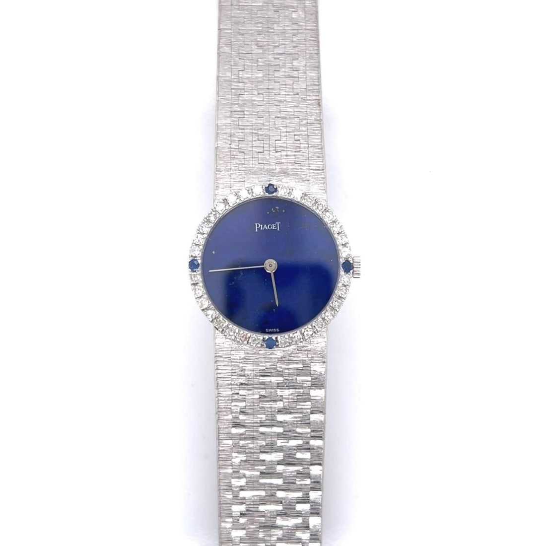 Piaget 18K White Gold Ladies Watch Lapis Lazuli Diamond Bezel: Piaget 18K White Gold Ladies Watch Lapis Lazuli Diamond Bezel Presenting an exquisite Piaget 18K White Gold Ladies Watch, beautifully designed with a stunning original Lapis Lazuli dial. This luxuriou