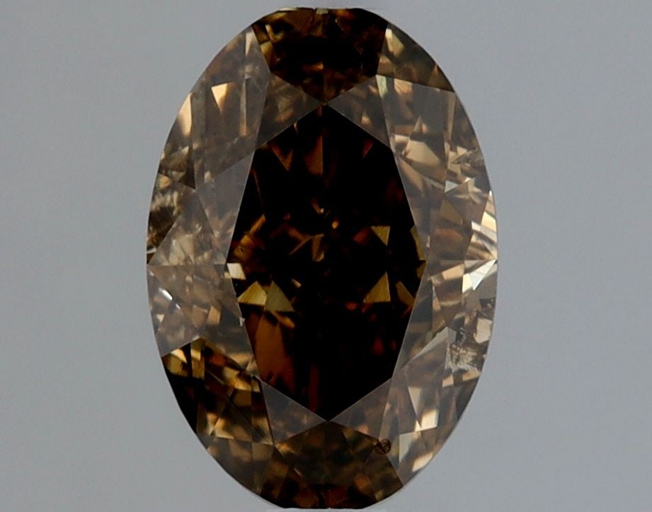 Loose Diamond - OVAL 1.01ct Fancy Dark Yellowish Brown SI2: Loose Diamond - OVAL 1.01ct Fancy Dark Yellowish Brown SI2 Source: Natural Shape: OVAL Carats: 1.01 Color: Fancy Dark Yellowish Brown Certification: GIA Video: