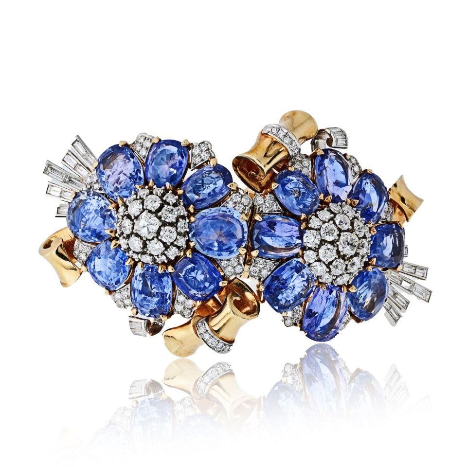 Retro Era 18K Yellow Gold Sapphire Diamond Bracelet by Trabert and Hoeffer Mauboussin: Retro Era 18K Yellow Gold Sapphire Diamond Bracelet by Trabert and Hoeffer Mauboussin This exquisite Retro bracelet, circa 1940s, is crafted by Mauboussin in collaboration with Trabert & Hoeffer. Made