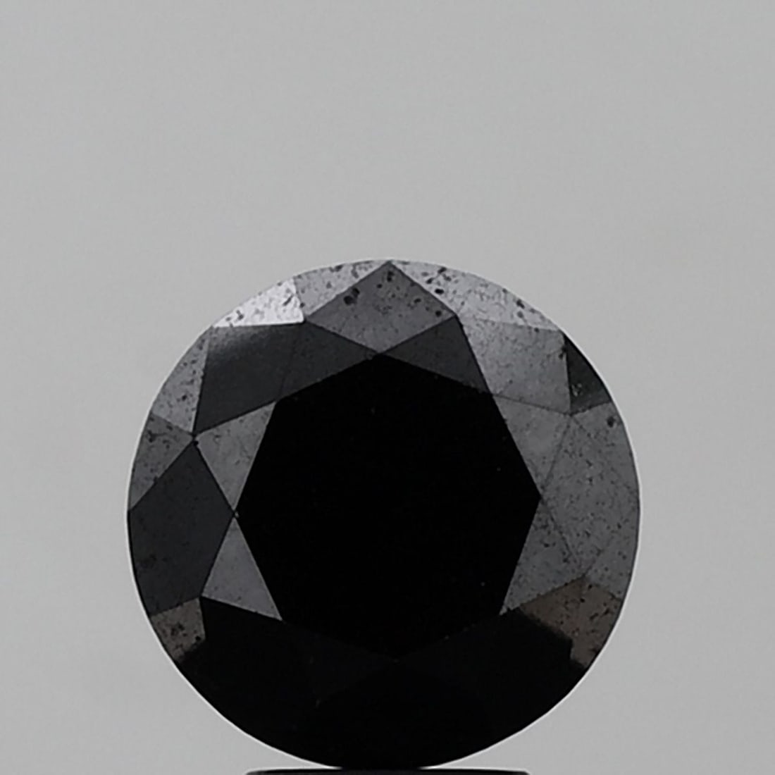 Loose Diamond - ROUND 5.74ct Fancy Black VS1: Loose Diamond - ROUND 5.74ct Fancy Black VS1 Source: Natural Shape: ROUND Carats: 5.74 Color: Fancy Black Certification: NONE Video: