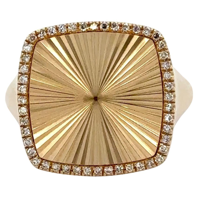 14K Yellow Gold Cushion Halo Ring with 0.18 CTW Round Diamonds: 14K Yellow Gold Cushion Halo Ring with 0.18 CTW Round Diamonds This cushion-shaped fashion ring is crafted from solid 14K yellow gold and features a radiant sunburst-finished center, elegantly framed 