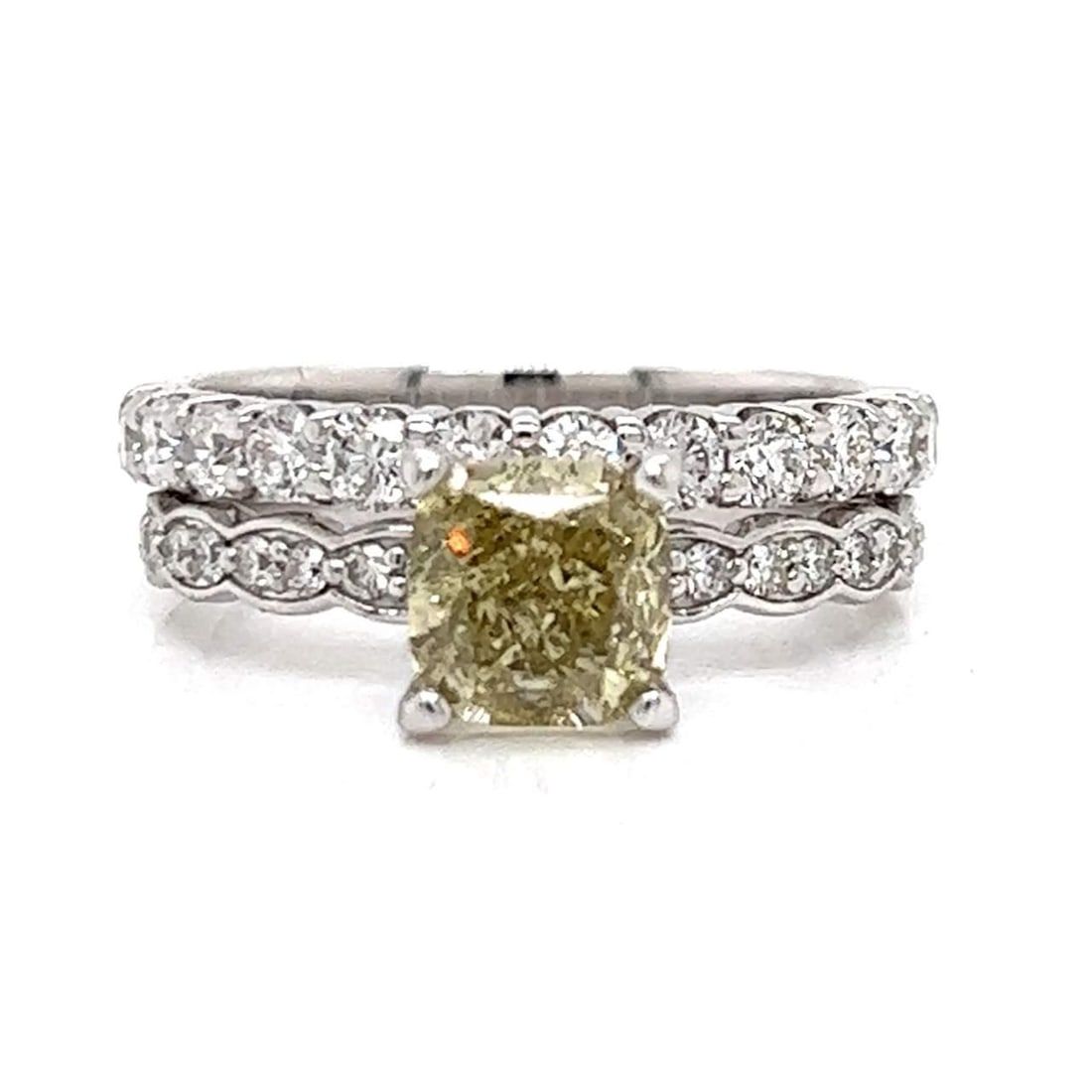 14K White Gold GIA Certified 1.59 Ct Fancy Diamond Ring with 28 Diamonds: 14K White Gold GIA Certified 1.59 Ct Fancy Diamond Ring with 28 Diamonds This exquisite 14K White Gold ring features a GIA Certified Fancy Diamond at its center, weighing 1.59 Ct. The diamond is cushi