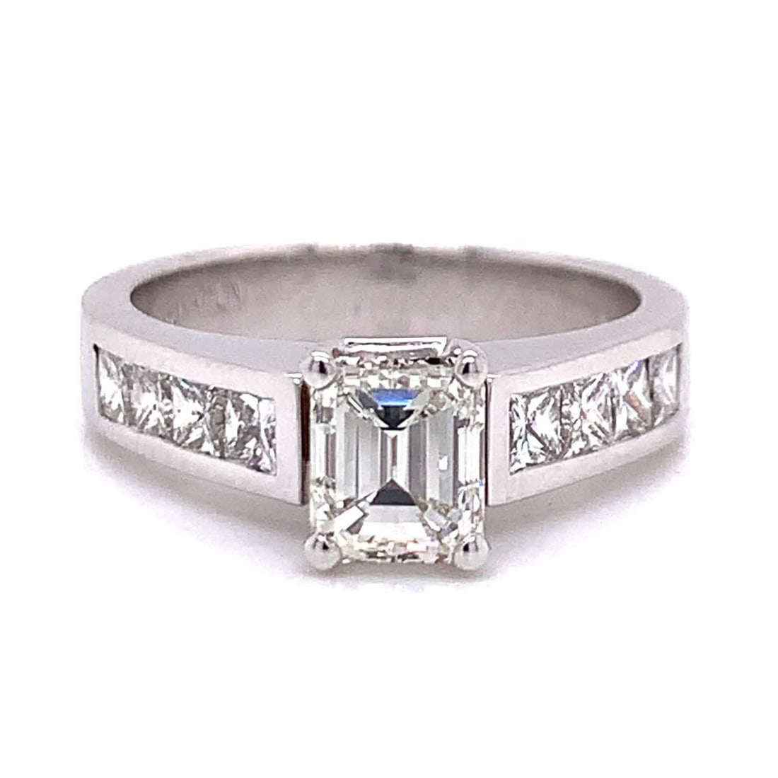 18K White Gold GIA Certified 1.00 Ct Emerald-cut Diamond Ring: 18K White Gold GIA Certified 1.00 Ct Emerald-cut Diamond Ring This exquisite 18K White Gold ring features a stunning 1.00 Ct. GIA Certified Emerald-cut Diamond, showcasing an I color and VS1 clarity. 