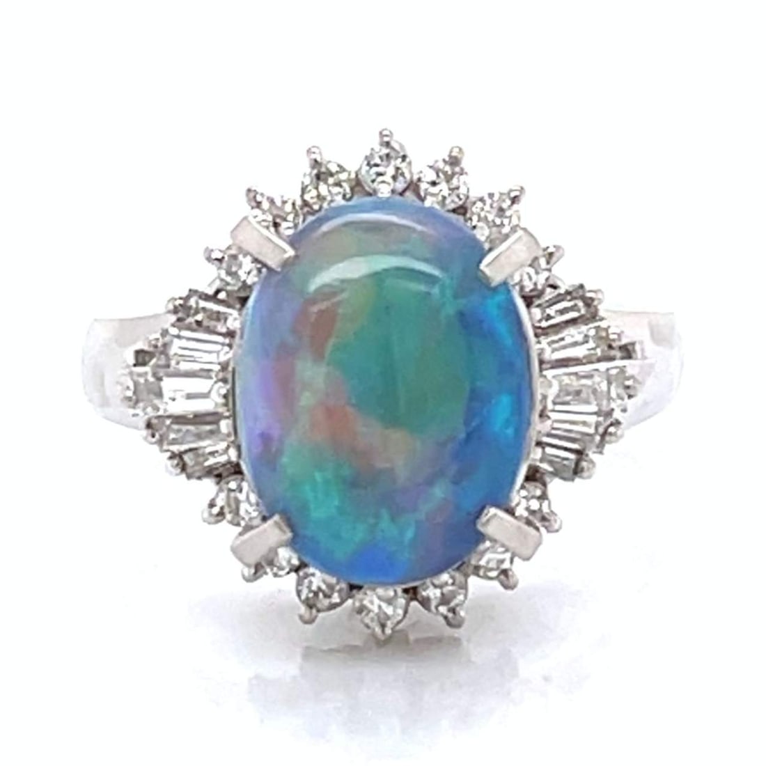 Exquisite Platinum Opal 3.50 Ct Diamond Ring with 24 G-H Diamonds: Exquisite Platinum Opal 3.50 Ct Diamond Ring with 24 G-H Diamonds This stunning Platinum Opal & Diamond Ring showcases an exquisite opal weighing approximately 3.50 Ct, complemented by 24 dazzling dia