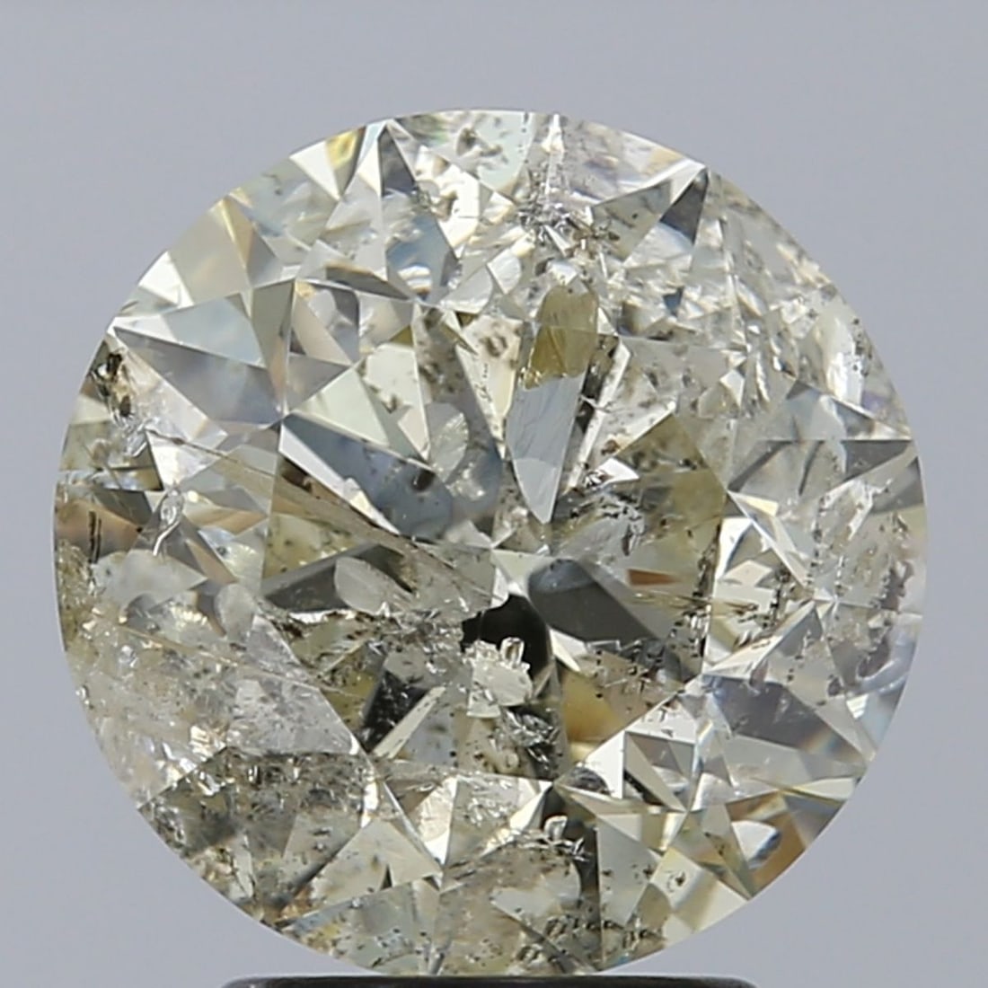 Loose Diamond - ROUND 3.12ct O-P I2: Loose Diamond - ROUND 3.12ct O-P I2 Source: Natural Shape: ROUND Carats: 3.12 Color: O-P Certification: NONE Video: