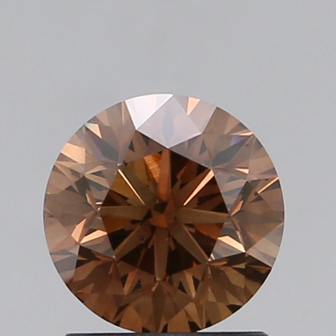 Loose Diamond - ROUND 1.19ct Fancy Dark Orangey Brown VS2: Loose Diamond - ROUND 1.19ct Fancy Dark Orangey Brown VS2 Source: Natural Shape: ROUND Carats: 1.19 Color: Fancy Dark Orangey Brown Certification: GIA Video: