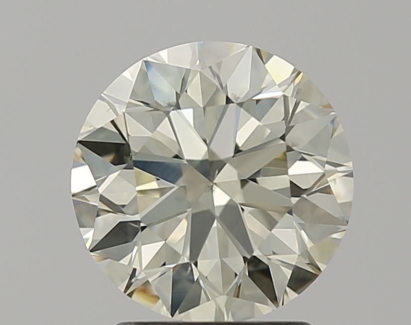 Loose Diamond - ROUND 2.12ct O-P SI1: Loose Diamond - ROUND 2.12ct O-P SI1 Source: Natural Shape: ROUND Carats: 2.12 Color: O-P Certification: GIA Video: