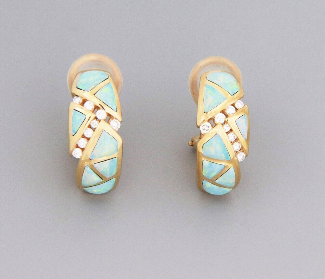 14k Yellow Gold Huggie Earrings with Diamonds and Opals by Kabana: 14k Yellow Gold Huggie Earrings with Diamonds and Opals by Kabana These authentic Kabana huggie earrings are crafted from solid 14k yellow gold and feature a refined curved bar design. Each earring is