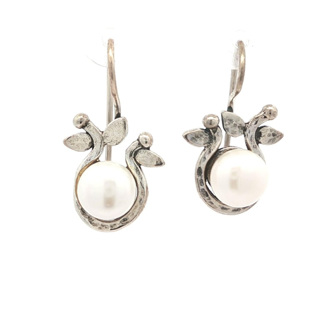 Handmade Sterling Silver Floral Pearl Drop Earrings 7.81mm: Handmade Sterling Silver Floral Pearl Drop Earrings 7.81mm Elegant and handcrafted, these drop earrings feature genuine cultured pearls set in a stunning floral wrap design. The earrings showcase two 