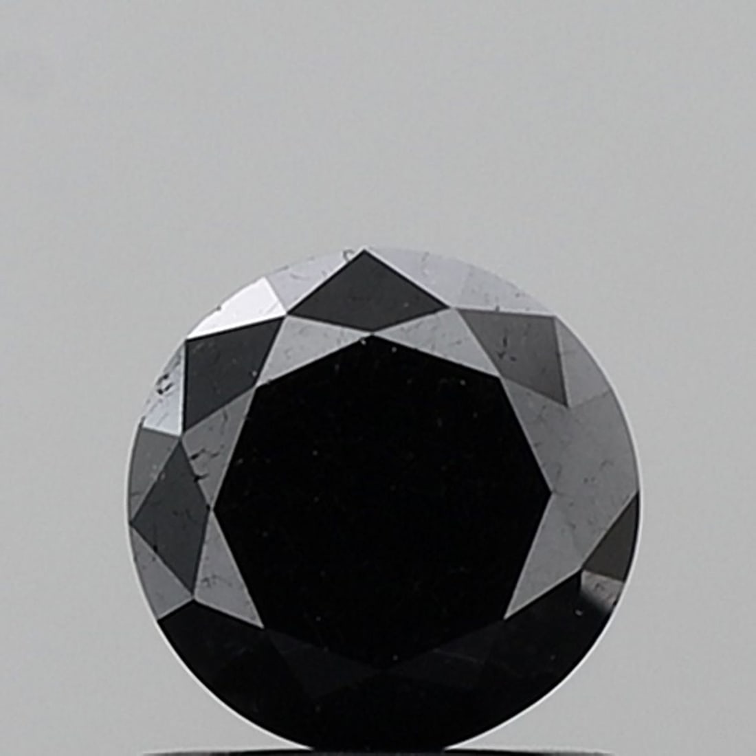 Loose Diamond - ROUND 1.1ct Fancy Black VS1: Loose Diamond - ROUND 1.1ct Fancy Black VS1 Source: Natural Shape: ROUND Carats: 1.1 Color: Fancy Black Certification: NONE Video: