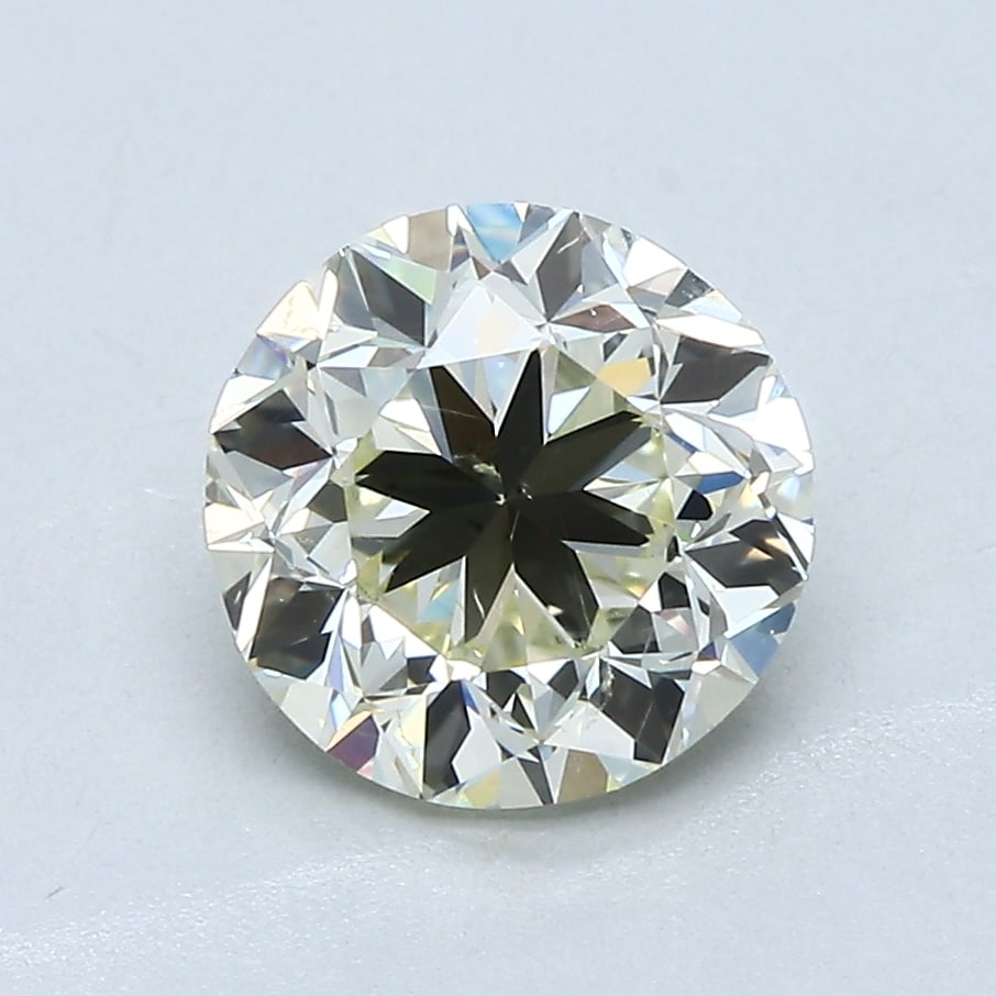 Loose Diamond - Round 2.01ct M SI1: Loose Diamond - Round 2.01ct M SI1 Source: Natural Mined Diamond Shape: Round Carats: 2.01 Color: M Clarity: SI1 Certification: IGI Condition: Pre-Owned PLEASE NOTE: Framed, Large, or heavy items do n