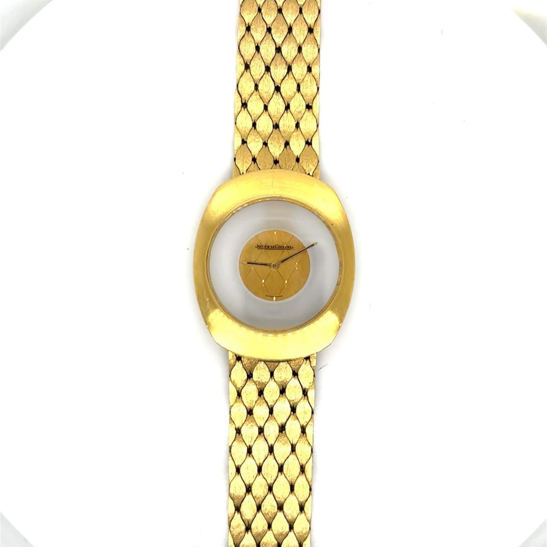1960s Jaeger LeCoultre 18K Yellow Gold Manual Dress Watch: 1960s Jaeger LeCoultre 18K Yellow Gold Manual Dress Watch This exquisite 1960's Jaeger LeCoultre dress watch is crafted from 18K yellow gold, embodying timeless elegance. Weighing 86.6 grams, it featu