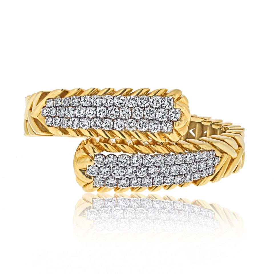 David Webb 8.75ct Diamond Crossover Bracelet in Platinum Gold: David Webb 8.75ct Diamond Crossover Bracelet in Platinum Gold Elevate your jewelry collection with this exquisite David Webb Crossover Bracelet, crafted in luxurious Platinum and 18K Yellow Gold. The 