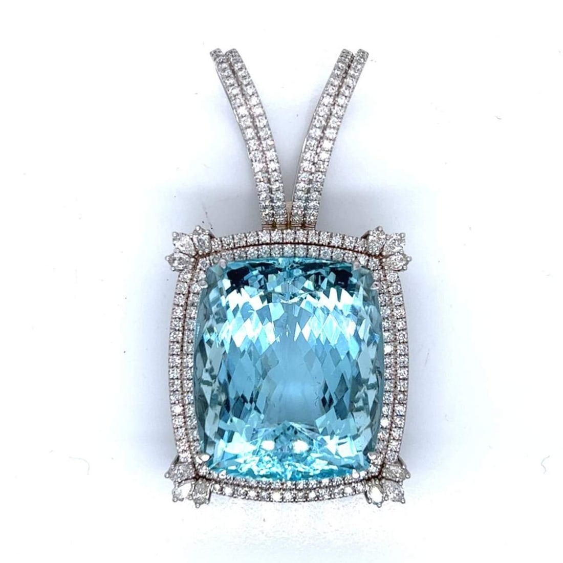 GIA Certified 89.93 Ct Aquamarine Diamond Pendant in 18K White Gold: GIA Certified 89.93 Ct Aquamarine Diamond Pendant in 18K White Gold This stunning 18K White Gold pendant features a remarkable GIA Certified Aquamarine weighing an impressive 89.93 Ct. The pendant is 