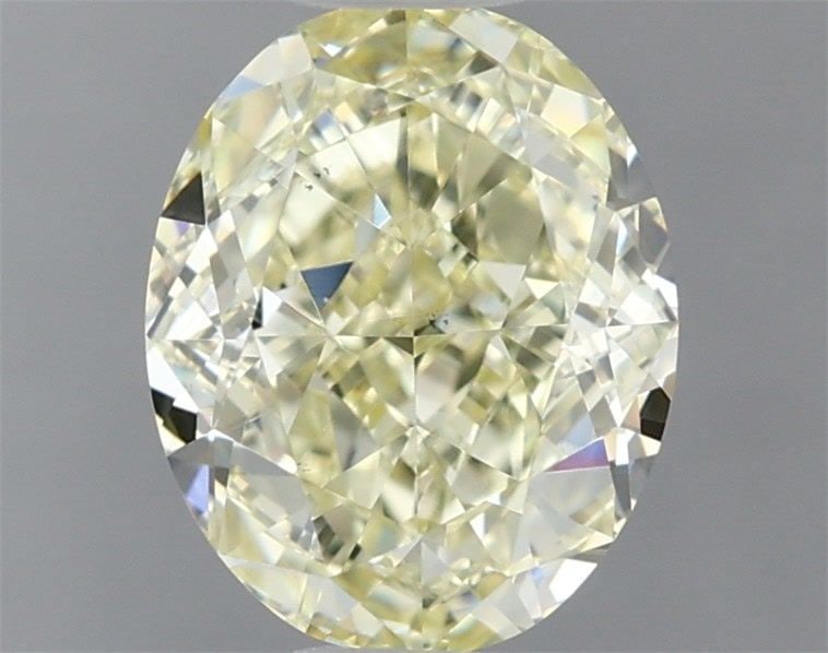 Loose Diamond - OVAL 1.38ct Fancy Light Yellow VS2: Loose Diamond - OVAL 1.38ct Fancy Light Yellow VS2 Source: Natural Shape: OVAL Carats: 1.38 Color: Fancy Light Yellow Certification: GIA Video: