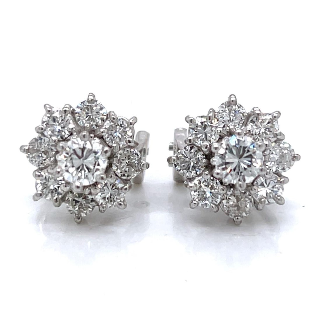 French 18K White Gold Diamond Earrings 3.65 Ct VVS-VS1: French 18K White Gold Diamond Earrings 3.65 Ct VVS-VS1 Elevate your elegance with these stunning French 18K White Gold Diamond Earrings. Each earring is adorned with 18 dazzling diamonds, collectively