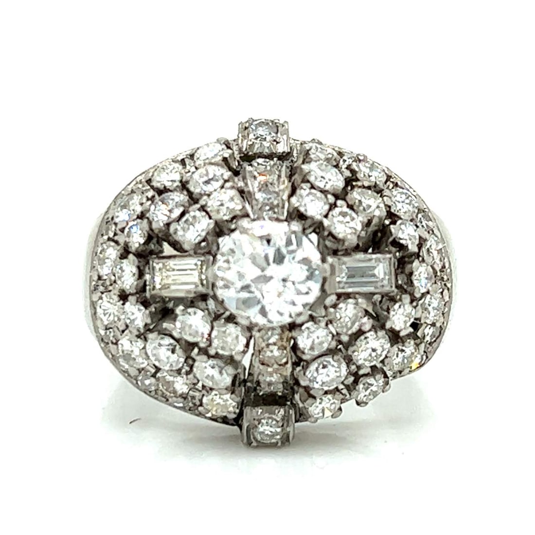 Art Deco Platinum 1.17 Ct GIA Diamond Ring with 74 Diamonds: Art Deco Platinum 1.17 Ct GIA Diamond Ring with 74 Diamonds This exquisite Art Deco ring is crafted in platinum and features a stunning GIA Certified diamond weighing 1.17 Ct. The center diamond boast