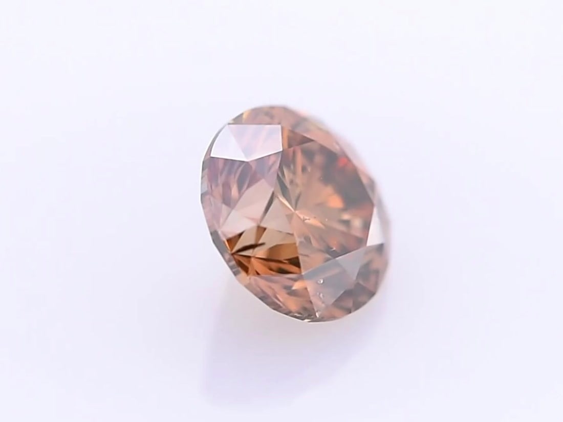 Loose Diamond - ROUND 2.5ct Fancy Orange Brown SI2: Loose Diamond - ROUND 2.5ct Fancy Orange Brown SI2 Source: Natural Shape: ROUND Carats: 2.5 Color: Fancy Orange Brown Certification: GIA Video: