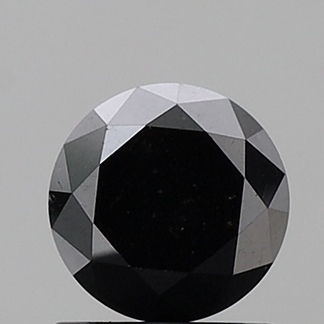 Loose Diamond - ROUND 1.25ct Fancy Black VVS2: Loose Diamond - ROUND 1.25ct Fancy Black VVS2 Source: Natural Shape: ROUND Carats: 1.25 Color: Fancy Black Certification: NONE Video: