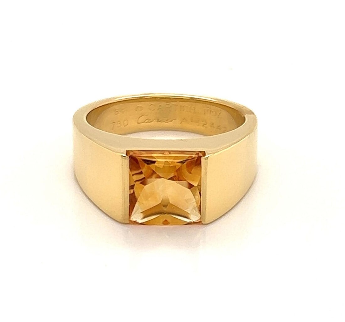 Tank Collection Citrine Square Ring in 18K Yellow Gold by Cartier Size 7: Tank Collection Citrine Square Ring in 18K Yellow Gold by Cartier Size 7 This authentic Cartier Tank ring showcases a vibrant square-cut citrine set in solid 18k yellow gold. Featuring a refined half-