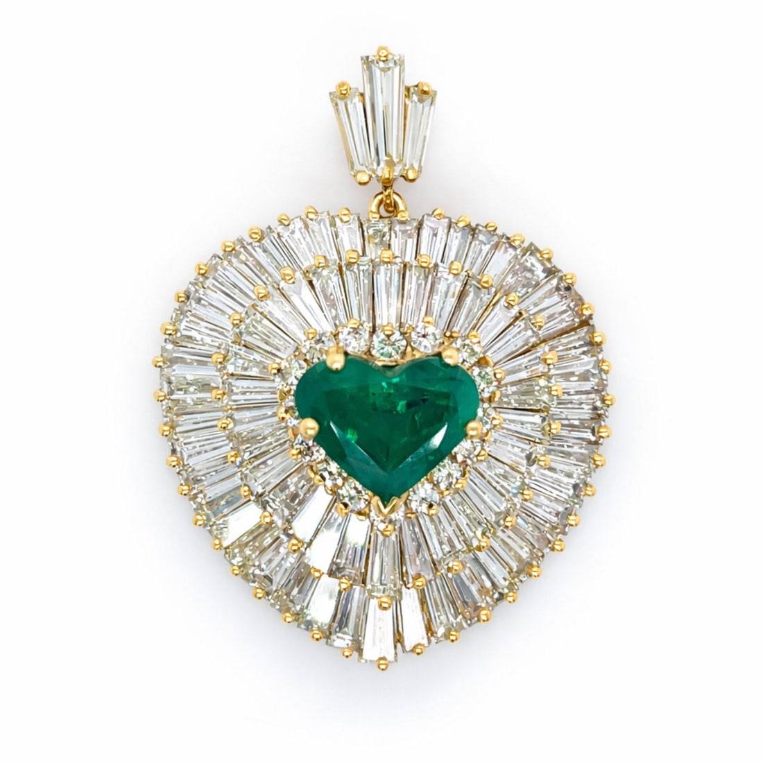 Heart Pendant in 14K Yellow Gold with Emerald and Diamond Accents: Heart Pendant in 14K Yellow Gold with Emerald and Diamond Accents This pre-owned pendant features a heart design crafted in 14K yellow gold. It is set with an approximately 4.50 carat emerald, accente