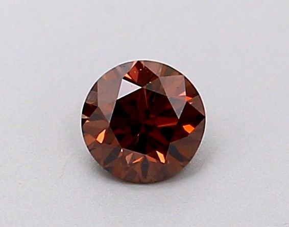 Loose Diamond - ROUND 0.18ct Fancy Reddish Brown VS2: Loose Diamond - ROUND 0.18ct Fancy Reddish Brown VS2 Source: Natural Shape: ROUND Carats: 0.18 Color: Fancy Reddish Brown Certification: NONE Video: