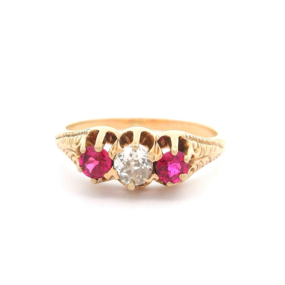 Antique Victorian 10k Rosy Yellow Gold Diamond Three Stone Ring: Antique Victorian 10k Rosy Yellow Gold Diamond Three Stone Ring This exquisite Antique Victorian cocktail ring showcases a stunning arrangement of three stones, featuring a central natural genuine dia