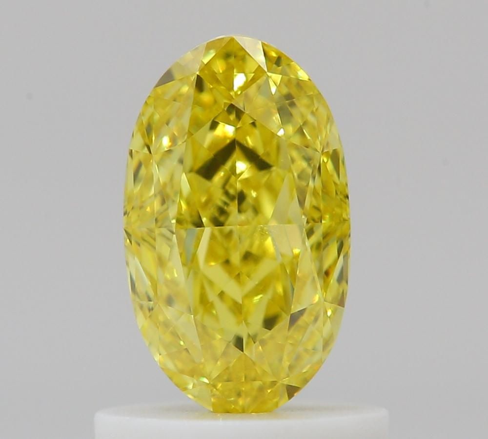 Loose Diamond - OVAL 1.0ct Fancy Vivid Yellow VVS1: Loose Diamond - OVAL 1.0ct Fancy Vivid Yellow VVS1 Source: Natural Shape: OVAL Carats: 1.0 Color: Fancy Vivid Yellow Certification: GIA Video:
