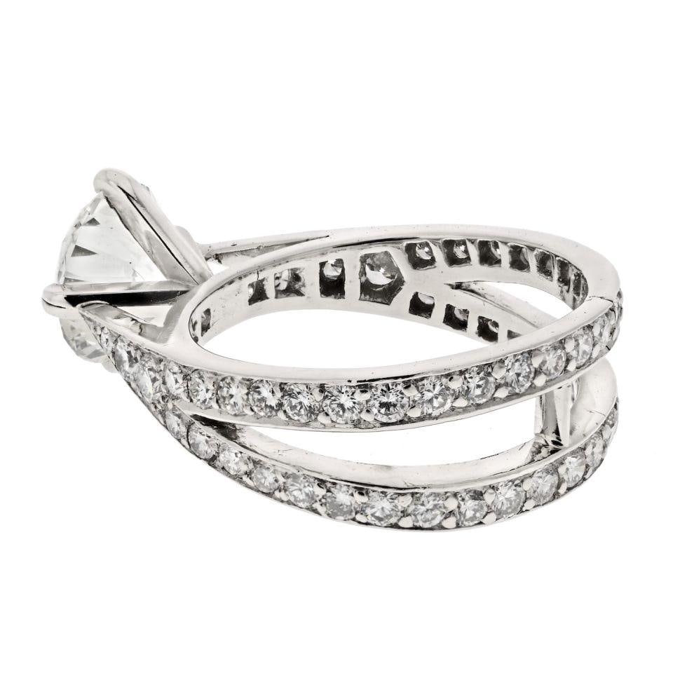 Tiffany & Co. 1.79ct Round Diamond Engagement Ring GIA Certified: Tiffany & Co. 1.79ct Round Diamond Engagement Ring GIA Certified This exquisite estate engagement ring by Tiffany & Co. features a stunning 1.79 carat round brilliant cut diamond at its center, showca
