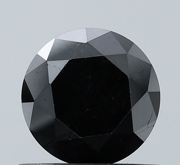 Loose Diamond - ROUND 0.85ct Fancy Black VS1: Loose Diamond - ROUND 0.85ct Fancy Black VS1 Source: Natural Shape: ROUND Carats: 0.85 Color: Fancy Black Certification: NONE Video: