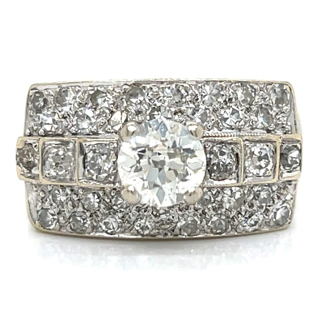 Art Deco 14K White Gold Diamond Ring 1.05 Ct Center 36 Surrounding Diamonds: Art Deco 14K White Gold Diamond Ring 1.05 Ct Center 36 Surrounding Diamonds This stunning Art Deco ring features a luxurious 14K white gold setting adorned with a central diamond weighing approximatel
