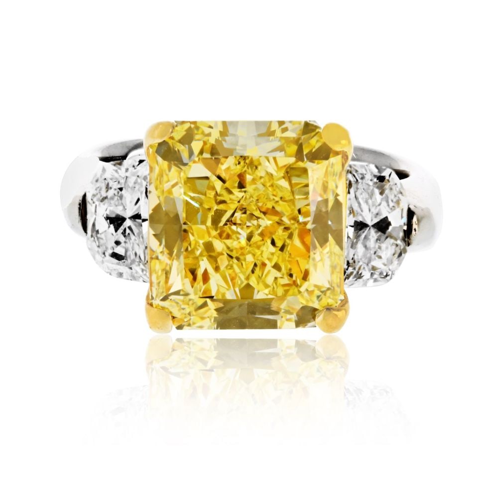 7.20 Carat GIA Fancy Intense Yellow Diamond Half Moons Ring in Platinum & 18K Gold: 7.20 Carat GIA Fancy Intense Yellow Diamond Half Moons Ring in Platinum & 18K Gold This exquisite three-stone diamond engagement ring features a breathtaking blend of platinum and 18K yellow gold. The