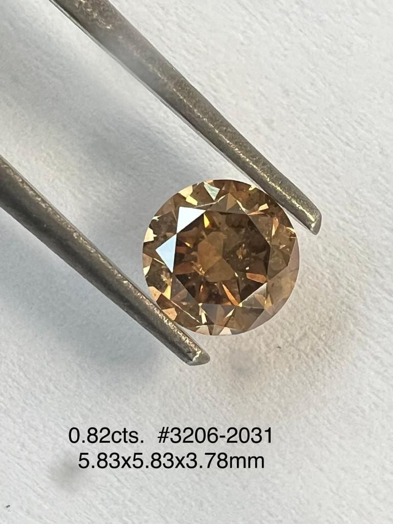 Loose Diamond - ROUND 0.82ct Brown SI2: Loose Diamond - ROUND 0.82ct Brown SI2 Source: Natural Shape: ROUND Carats: 0.82 Color: Brown Certification: NONE Video: