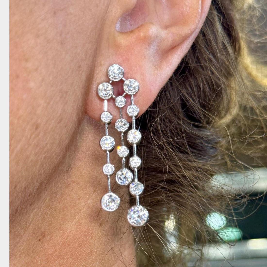 18K White Gold Diamond Earrings 7.20 Ct 32 Diamonds VVS-VS: 18K White Gold Diamond Earrings 7.20 Ct 32 Diamonds VVS-VS Elevate your elegance with these stunning 18K White Gold Diamond Earrings. Crafted in luxurious white gold, these earrings feature a total of