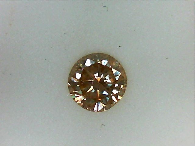Loose Diamond - ROUND 0.63ct Light Champagne SI2: Loose Diamond - ROUND 0.63ct Light Champagne SI2 Source: Natural Shape: ROUND Carats: 0.63 Color: Light Champagne Certification: NONE PLEASE NOTE: Framed, Large, or heavy items do not have shipping co