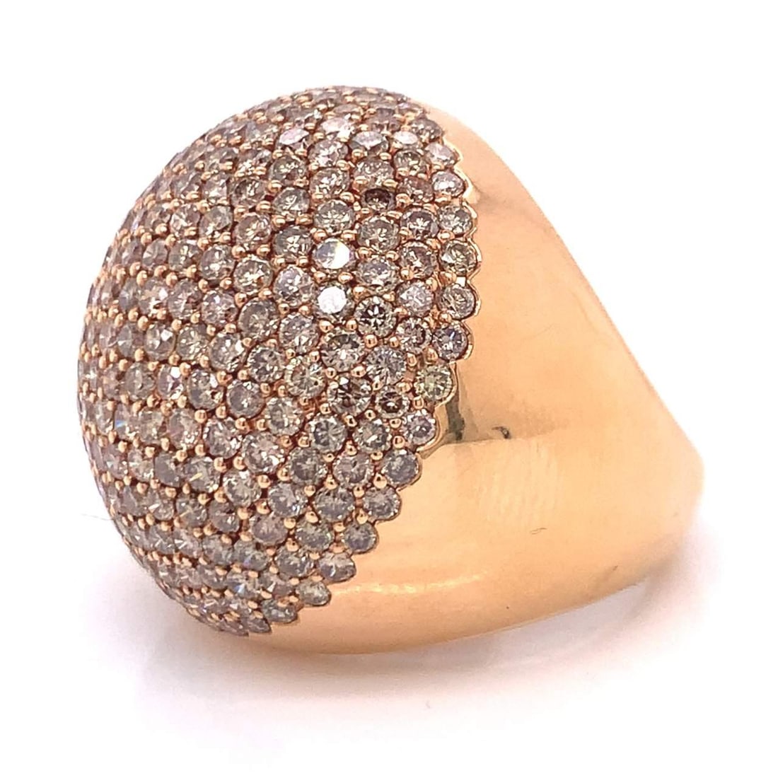 18k Rose Gold 5.17 Ct Champagne Diamond Cocktail Ring: 18k Rose Gold 5.17 Ct Champagne Diamond Cocktail Ring This exquisite cocktail ring features a stunning array of champagne diamonds, totaling 5.17 carats, set in luxurious 18k rose gold. The diamonds b