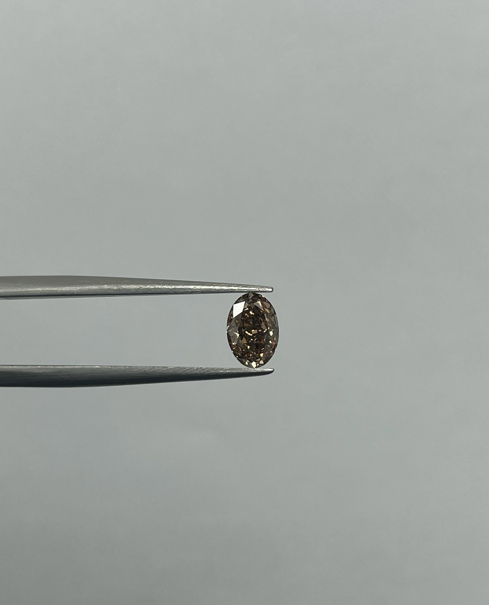 Loose Diamond - OVAL 1.01ct Fancy Deep Brownish Yellowish Orange VS2: Loose Diamond - OVAL 1.01ct Fancy Deep Brownish Yellowish Orange VS2 Source: Natural Shape: OVAL Carats: 1.01 Color: Fancy Deep Brownish Yellowish Orange Certification: GIA Video: