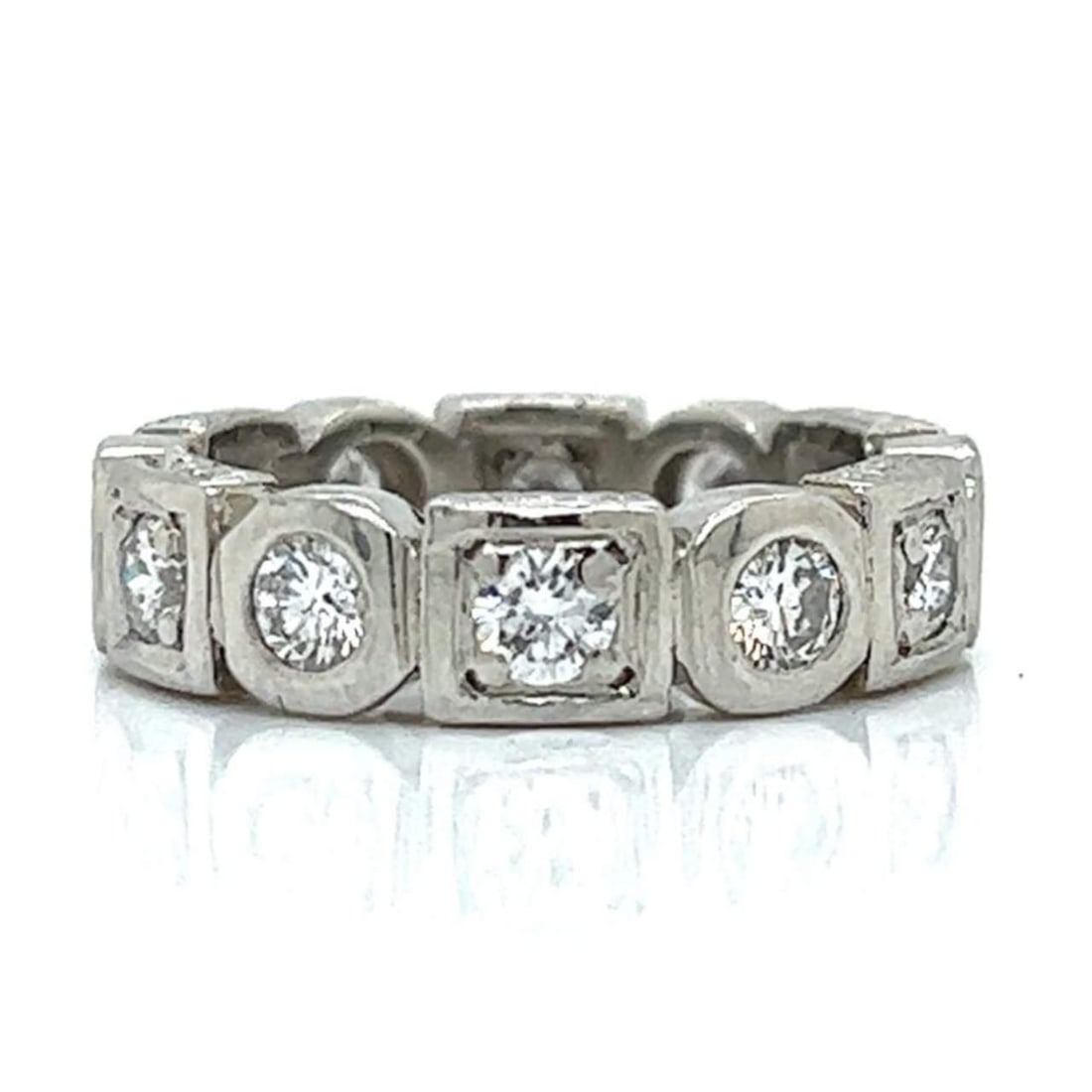 Platinum 1.40 Ct Diamond Band 12 Diamonds F-G VS1-SI1: Platinum 1.40 Ct Diamond Band 12 Diamonds F-G VS1-SI1 This exquisite platinum diamond band features a total diamond weight of approximately 1.40 ct, showcasing 12 stunning diamonds with F-G color and 