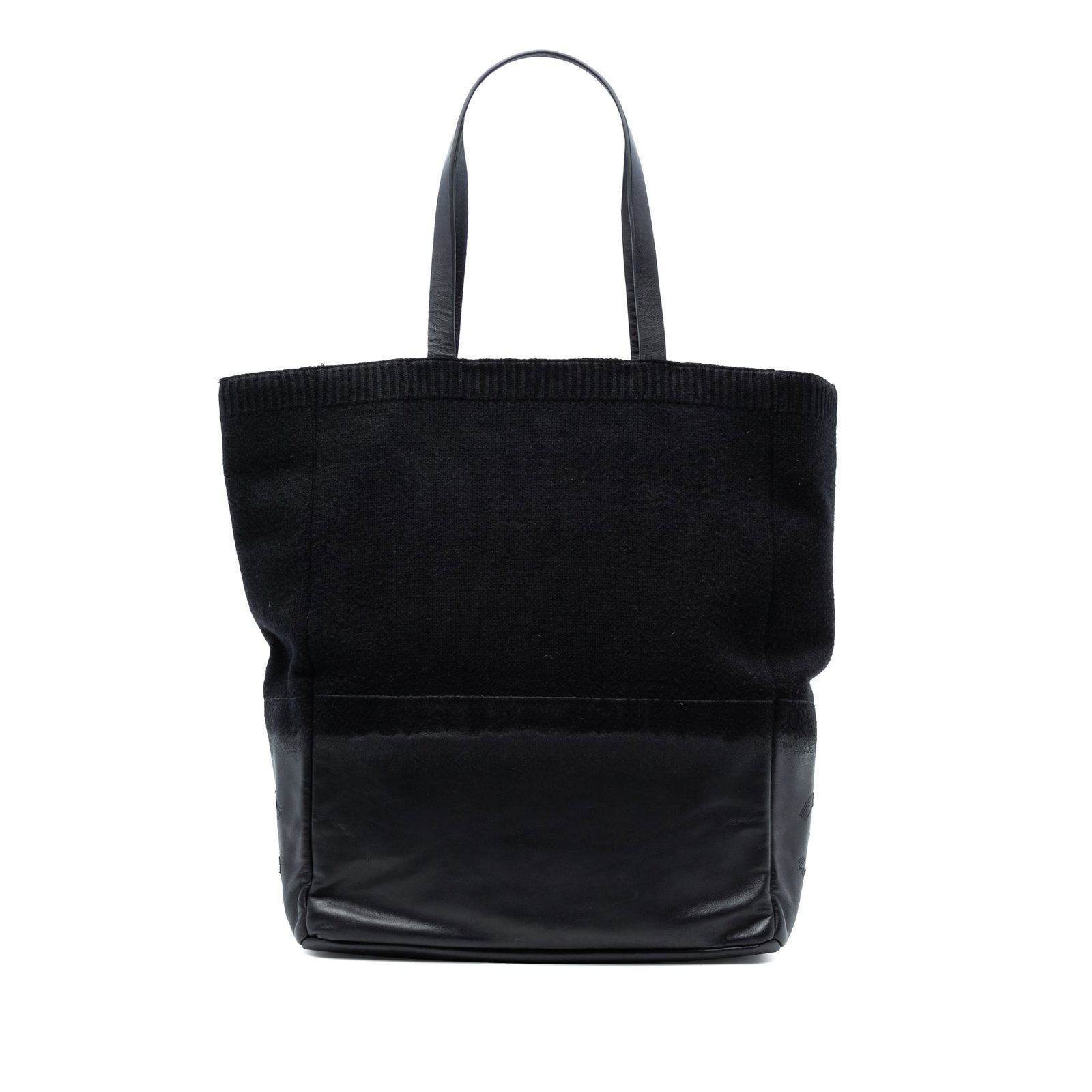 Chanel CC Black Wool and Leather Tote Bag Made in Italy: Chanel CC Black Wool and Leather Tote Bag Made in Italy This elegant Chanel CC Wool and Leather Tote bag combines luxurious wool and leather for a sophisticated look. It features flat leather straps, 