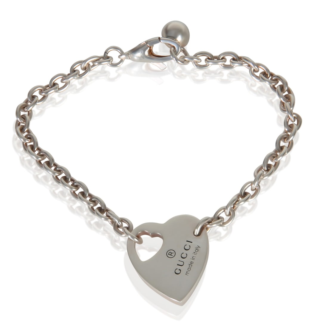 Sterling Silver Heart Charm Bracelet from Gucci Trademark Collection: Sterling Silver Heart Charm Bracelet from Gucci Trademark Collection This pre-owned Gucci Trademark Heart Charm Bracelet is crafted from 925 sterling silver and features a heart charm. The bracelet ha