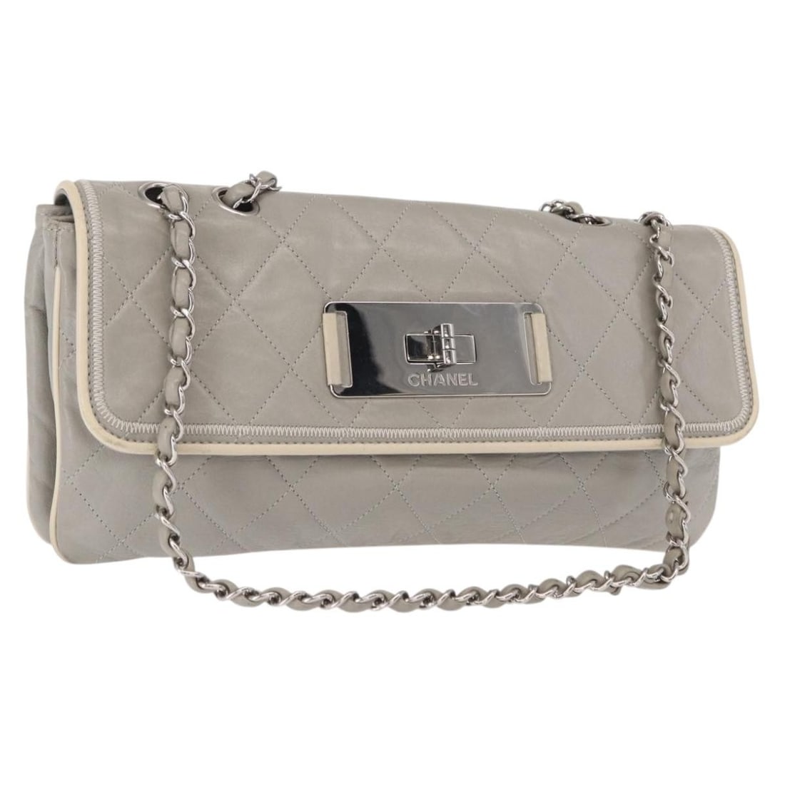 Chanel Mademoiselle Quilted Lambskin Leather Shoulder Bag Gray: Chanel Mademoiselle Quilted Lambskin Leather Shoulder Bag Gray This Chanel Mademoiselle Lock Flap Bag is crafted from quilted gray lambskin leather and designed for women. It features a chain shoulder