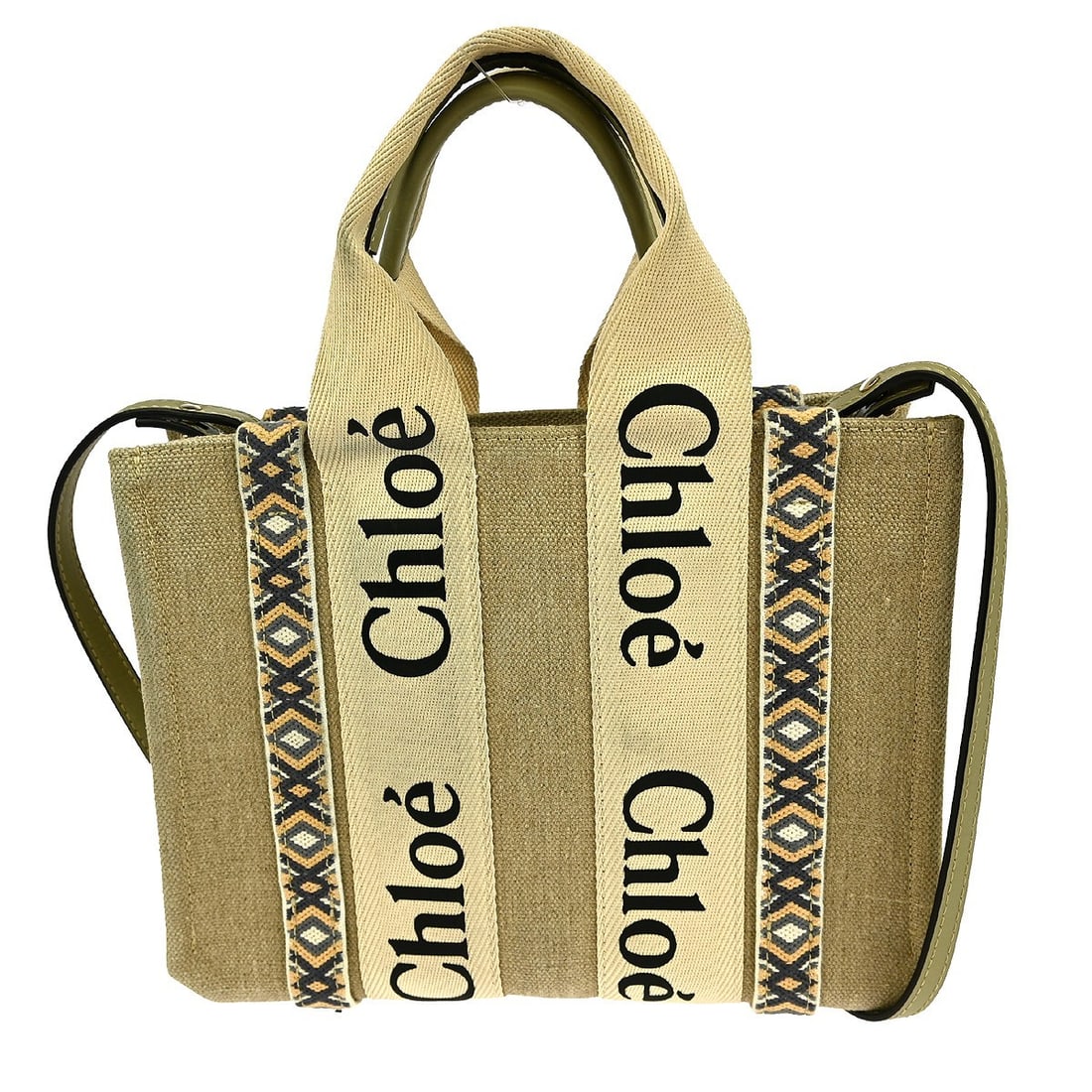 Chloe Woody Small Canvas Top Handle Bag in Beige 2way Design: Chloe Woody Small Canvas Top Handle Bag in Beige 2way Design This Chloe Beige Woody 2way Handbag is a stylish accessory perfect for casual occasions. It features a classic top handle design with doubl