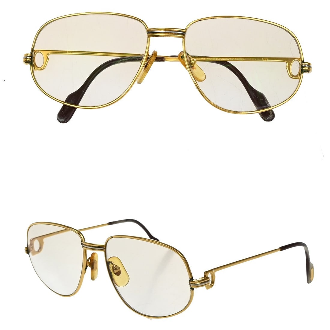 Cartier Metal Female Trinity Sunglasses Gold Tone Frame: Cartier Metal Female Trinity Sunglasses Gold Tone Frame These pre-owned Cartier Trinity sunglasses for women feature a gold metal frame. The lenses and frame show signs of wear including scuffs, dirt,
