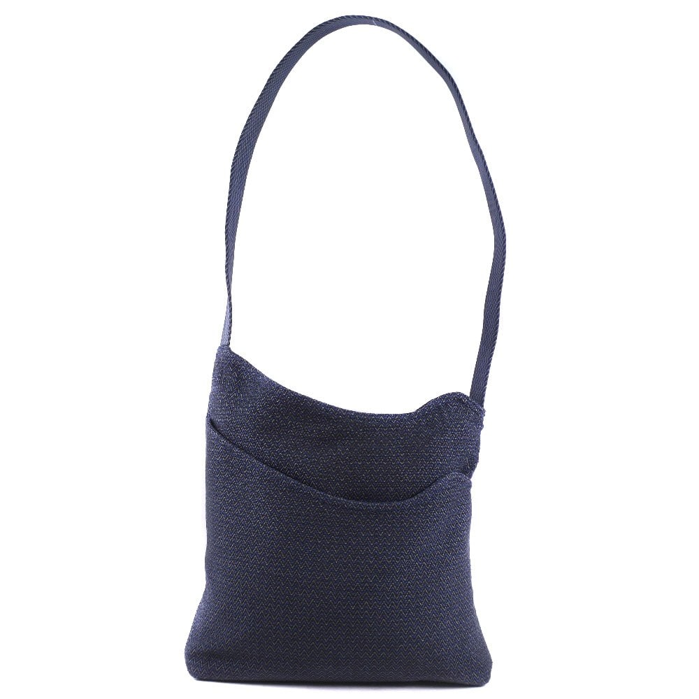 Vintage Hermes Canvas Blue Sac De Pansage Shoulder Bag: Vintage Hermes Canvas Blue Sac De Pansage Shoulder Bag This vintage Hermes Sac De Pansage shoulder bag is crafted from blue canvas and designed for unisex use. It features a practical size suitable fo