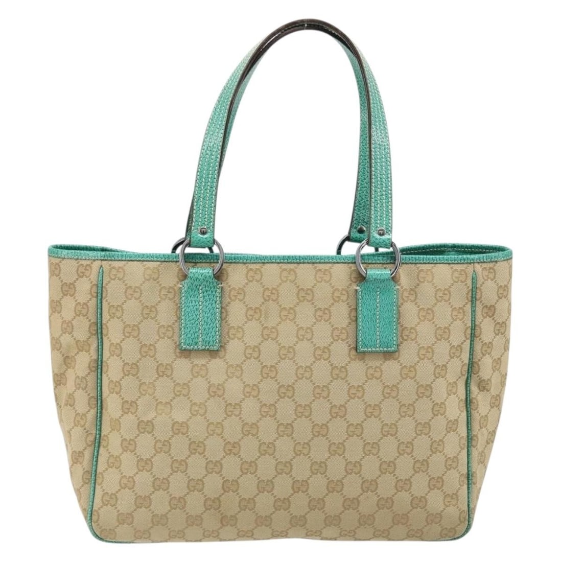Beige GG Canvas Vintage Open Tote Bag by Gucci: Beige GG Canvas Vintage Open Tote Bag by Gucci This Gucci Vintage Open Tote features signature GG canvas in beige and is designed specifically for women. The spacious interior and open top make it pra