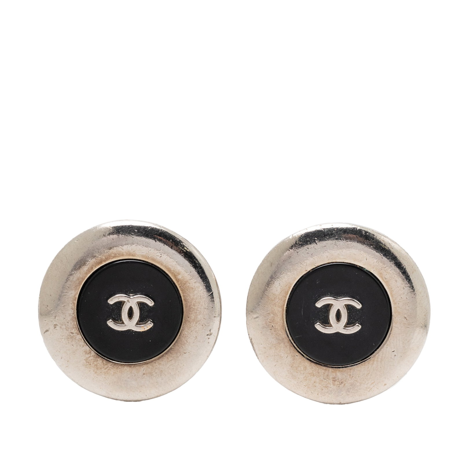 Chanel CC Round Clip On Earrings Silver Tone Metal and Enamel: Chanel CC Round Clip On Earrings Silver Tone Metal and Enamel These Chanel clip-on earrings feature a silver tone metal and enamel body, showcasing the iconic CC round button design. Made in France, t
