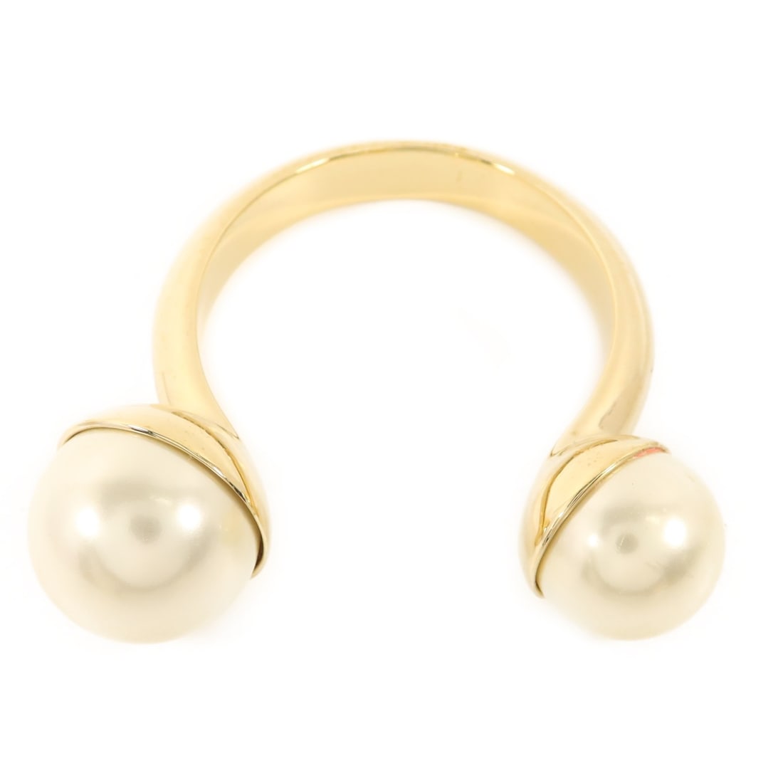 Dior Gold Tone Metal Bangle Bracelet for Women: Dior Gold Tone Metal Bangle Bracelet for Women This Christian Dior bangle features a gold-toned finish and a sleek, modern design. Crafted for women, it is made of metal and does not contain any stone