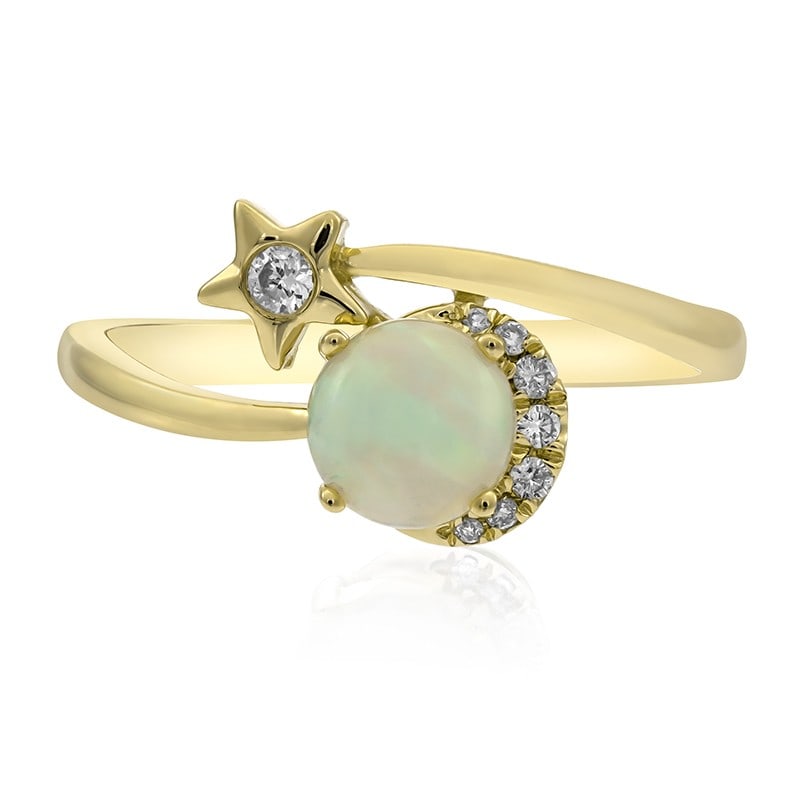 14K Yellow Gold Star Bypass Ring with Opal and Diamond Accents Size 7: 14K Yellow Gold Star Bypass Ring with Opal and Diamond Accents Size 7 This women's ring features a white opal as the main stone, accented by round brilliant cut diamonds in a star bypass design. Craft