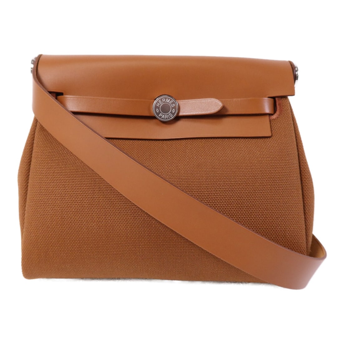 Hermes Mini Herbag Brown Canvas Shoulder Bag with Palladium Hardware: Hermes Mini Herbag Brown Canvas Shoulder Bag with Palladium Hardware This Hermes Mini Herbag shoulder bag features a brown H canvas exterior with palladium hardware. Designed for women, it is crafted 
