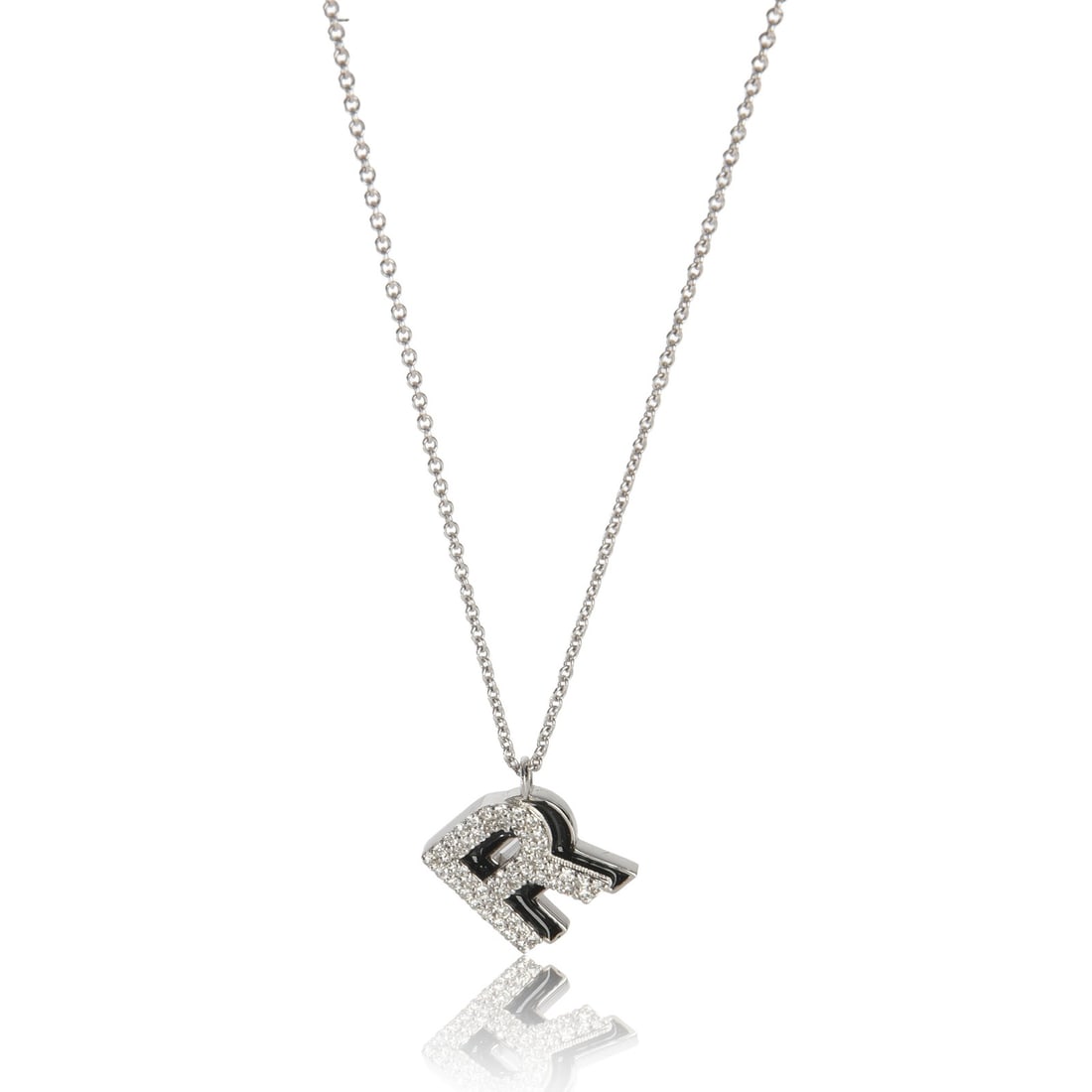 14K White Gold Pendant with Diamonds and Black Enamel Letter R: 14K White Gold Pendant with Diamonds and Black Enamel Letter R This pre-owned women's pendant features a round brilliant diamond set in 14K white gold with black enamel detailing, showcasing the initi